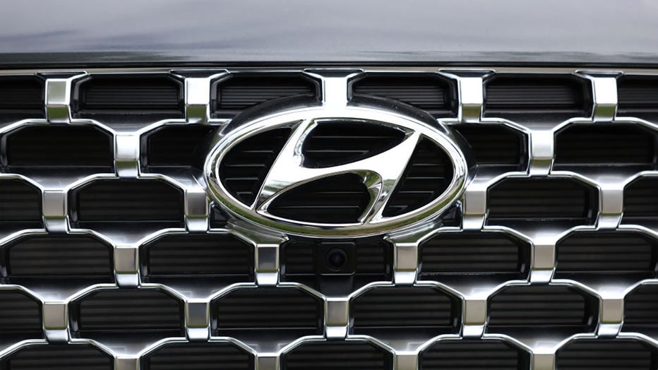 FILE - The Hyundai logo is displayed on a new car on the sales lot at San Leandro Hyundai on May 30, 2023, in San Leandro, California. (Photo by Justin Sullivan/Getty Images)