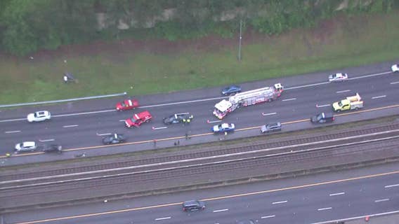 Fiery crash blocking multiple lanes of Georgia 400 in Buckhead