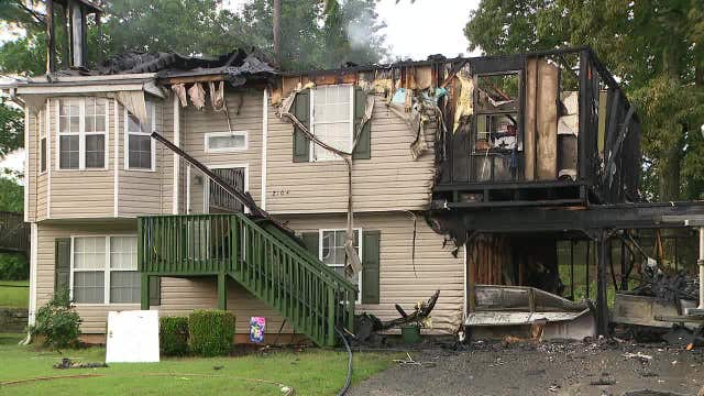 Family of 3 escapes burning home in Lithonia