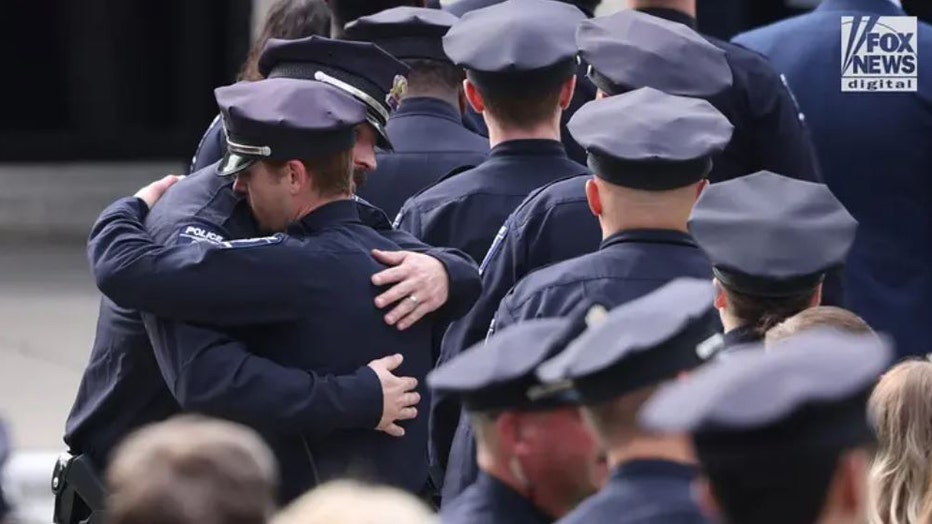 Funeral-for-Charlotte-officer-VI.jpg