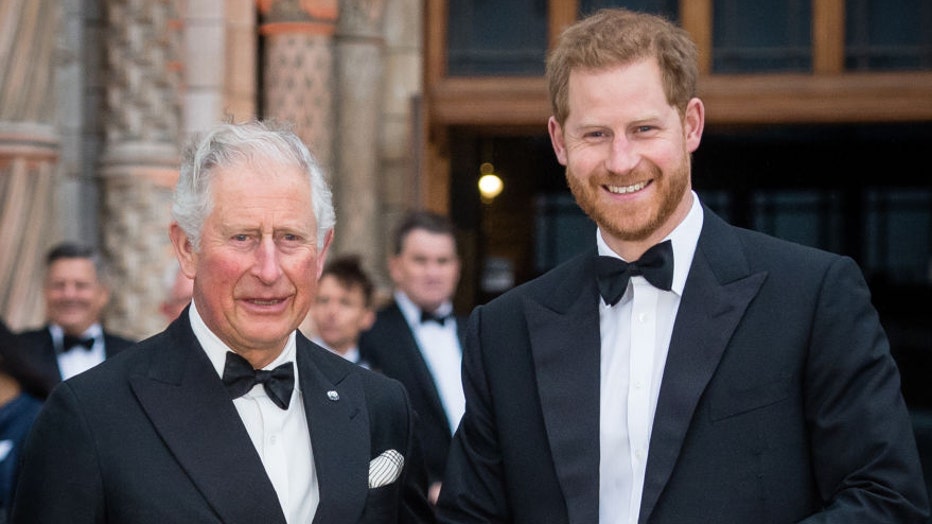 prince harry and king charles in formal wear smiling