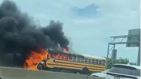 Video: School bus catches fire on Massachusetts expressway