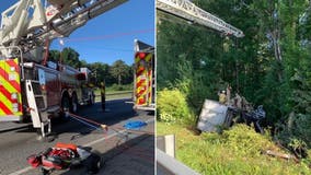 Box truck passengers rescued after truck goes over I-20 guardrail