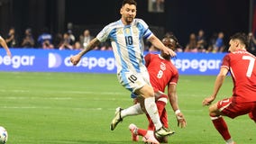 Messi creates both goals as Argentina opens Copa América title defense by beating Canada 2-0