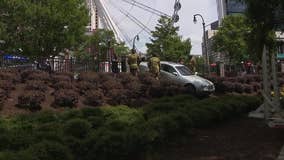 Car crashes through fence near Centennial Olympic Park