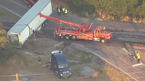 Collision involving train, tractor-trailer in McDonough blocks road