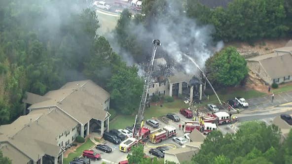 Fire tears through Douglasville apartments, injuring 3