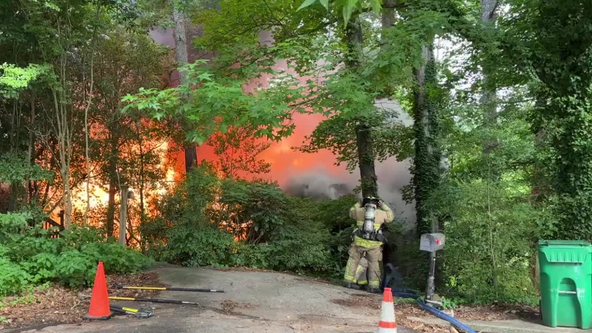 Construction crew, neighbors save man, disabled wife from house fire in DeKalb County