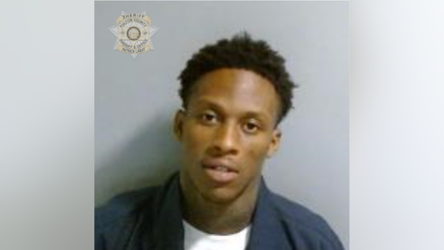 Man arrested for Center Street shooting of woman found with toddler in car
