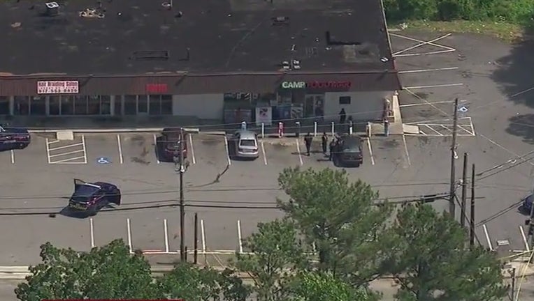 Atlanta police investigate a shooting at a strip mall along Campbellton Road in southwest Atlanta on June 6, 2024.