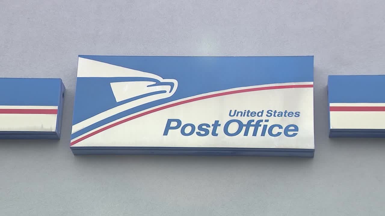 Postal worker accused of stealing gift cards, cash from holiday mail