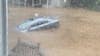 Car floats away, basement flooded, gazebo clogs drain, pipes burst in Cobb County cul-de-sac