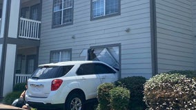 Driver arrested after SUV crashes into Gainesville apartment, child hospitalized