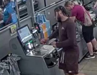 Newnan police released this video showing a man stealing from a Walmart store using a TikTok hack.