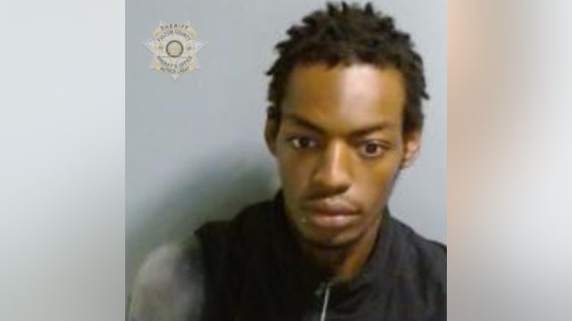 Man charged in deadly beating on Ted Turner drive, police say