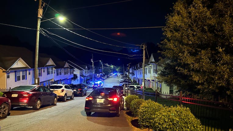 Atlanta police investigate a report of a person shot at an apartment complex off Fairburn Road on July 31, 2024.