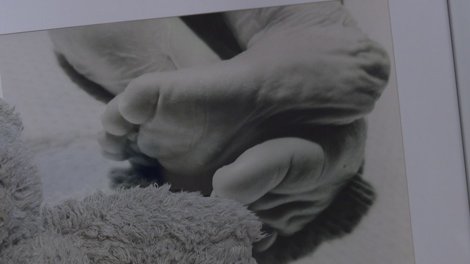 Katherine Laza, who launched losslink.com, a new social media site dedicated to mothers who have lost their children, shows the feet of her stillborn son, Brody. It is an image which had been removed from traditional social media sites.