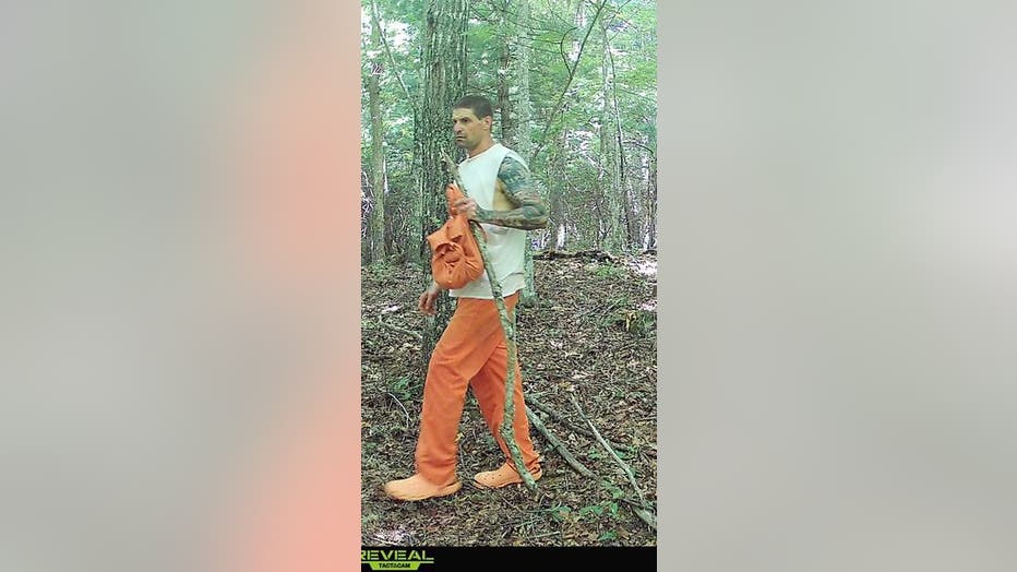 Images from a trail camera at the end of Ivy Mountain Road shows Bruce Douglas Partin, Jr. walking on July 16, 2024.