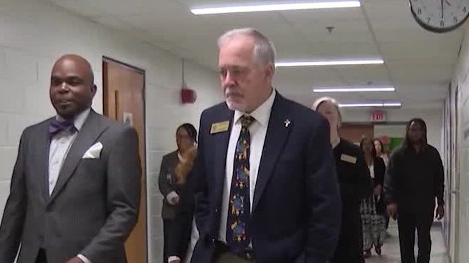 Georgia Superintendent of Schools Richard Woods, seen center, is touring a school in this undated photo.