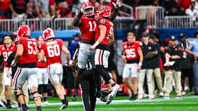 Beck throws 2 TD passes and No. 1 Georgia manhandles No. 14 Clemson 34-3