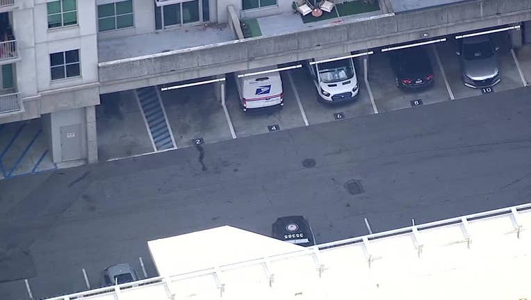 Atlanta police are investigating a shootout between a bystander and an armed robber who tried to rob a postal worker at a condo complex along Pharr Road in Buckhead on Aug. 1, 2024.