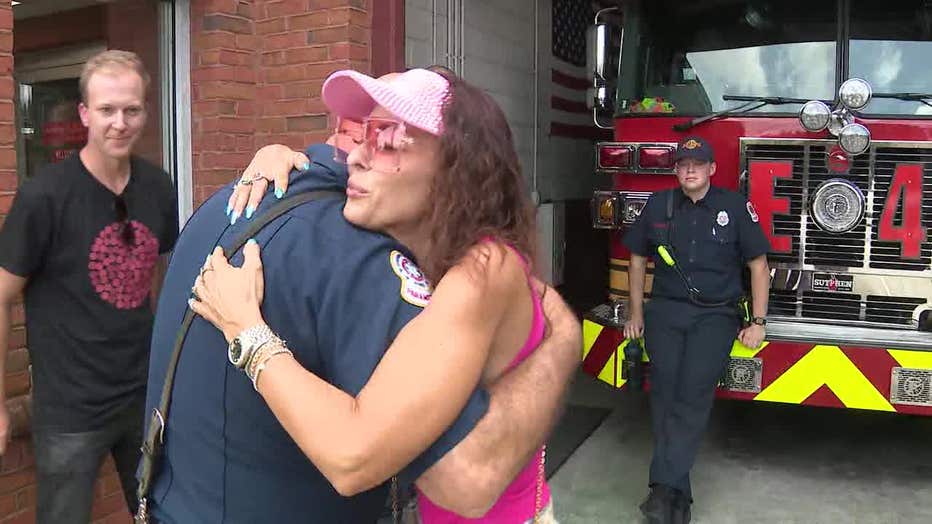 Robyn Fly reunites with the Gwinnett County firefighters who saved her after a dangerous wasp sting. 