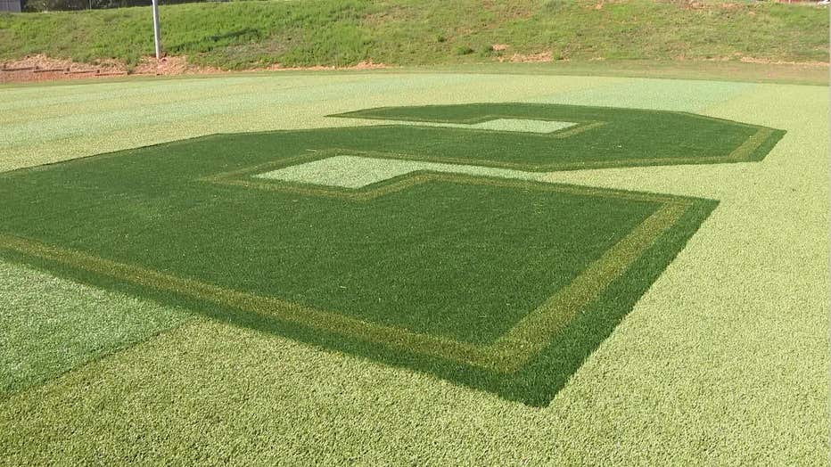 A No. 2 was placed in the middle of the baseball field at North Cobb Christian School to honor 10-year-old Walker Phillips.