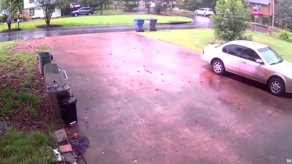 Video shows the moment a lightning struck a Cobb County home, sending it down a metal pipe into the garage and injuring Michael Coppeak, who was working on his motorcycle at the time. 