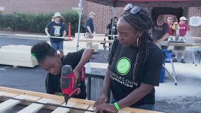 Georgia's Own Credit Union volunteers build 50 beds for kids