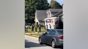 FedEx truck driver seriously injured after crashing into Gwinnett County home