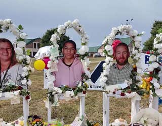 A memorial for Cristina Irimie, Mason Schermerhorn, Richard Aspinwall and Christian Angulo in front of Apalachee High School in Winder.
