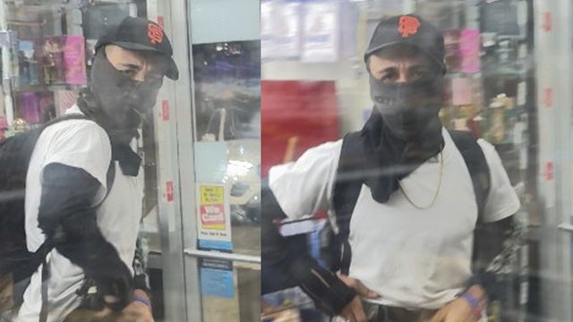 Masked man wanted for holding convenience store clerk at gunpoint, police say