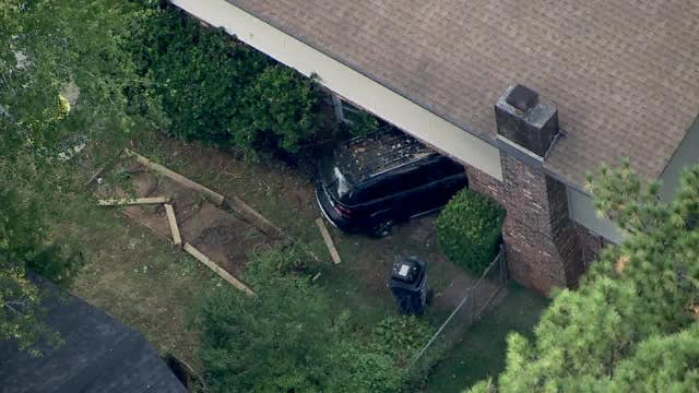Minivan smashes into Tucker home, investigation underway