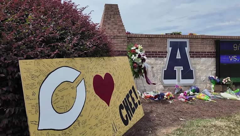 The Apalachee High School gathered to mourn those killed in Wednesday's attack, pray for those who were injured, and try come to grips with the atrocity at a makeshift memorial in front of the Winder school on Sept. 6, 2024.