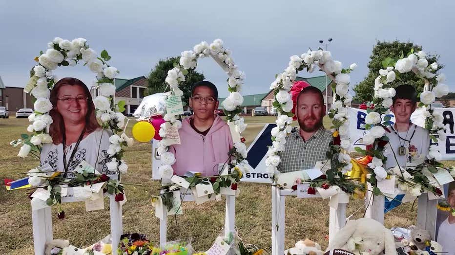 A memorial for Cristina Irimie, Mason Schermerhorn, Richard Aspinwall and Christian Angulo in front of Apalachee High School in Winder.