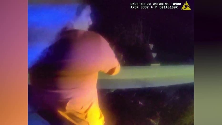 Gwinnett County police released body cam images showing the arrest of a man wanted for a roadside robbery along Buford Drive near I-985 on Sept. 20, 2024.