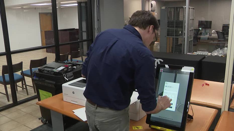 The Georgia Secretary of State's Office performs a "health check" on election systems ahead of the November election in DeKalb County on Sept. 17, 2024.