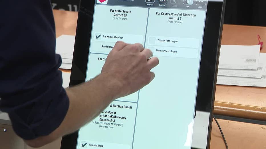 The Georgia Secretary of State's Office performs a "health check" on election systems ahead of the November election in DeKalb County on Sept. 17, 2024.