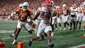 Georgia knocks off Texas 30-15, with Etienne running for 3 TDs