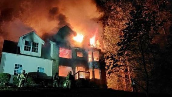 Snellville house consumed by fire partially collapses