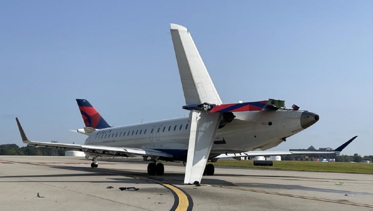 This photograph shows the CRJ after impact. 