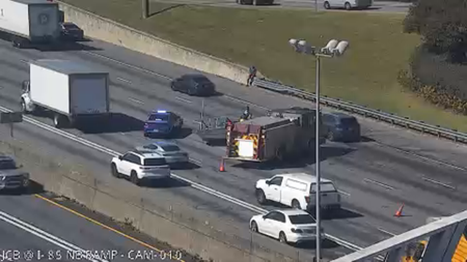 An image from a GDOT cam shows a boat in the middle of I-85 near Jimmy Carter Boulevard in Gwinnett County on Oct. 14, 2024. 