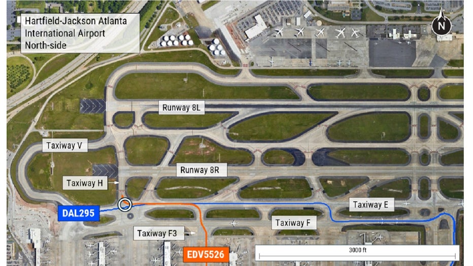 This image provided by the NTSB shows ground position tracks for DAL295 (A350) and EDV5526 (CRJ) in relation to taxiways E and H.