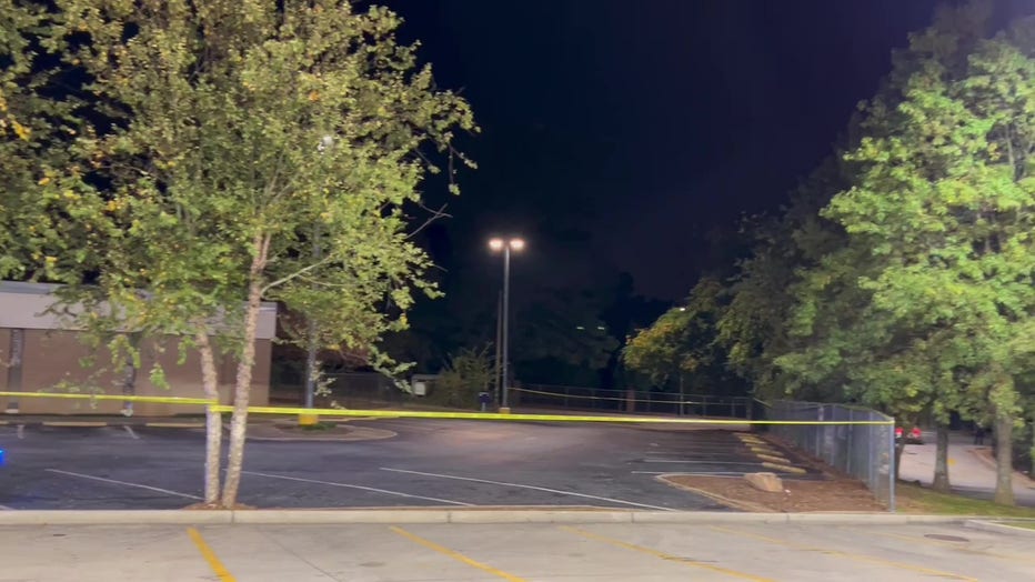 A parking lot in the 3100 block of Greenbriar Parkway SW was blocked by police tape after a shooting on Oct. 28, 2024.