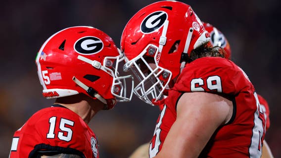 Beck throws for 2 TDs, runs for another to lead No. 11 Georgia past No. 6 Tennessee 31-17