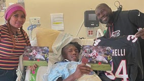 Former Falcons fullback visits injured Archer HS football player