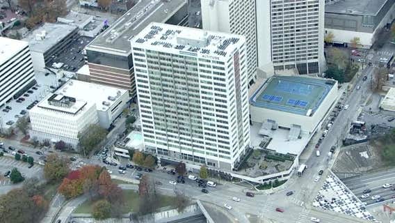 Man killed in fall, woman stabbed and shot in downtown Atlanta's hotel district