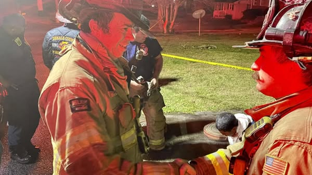 2 people rescued from burning Decatur home