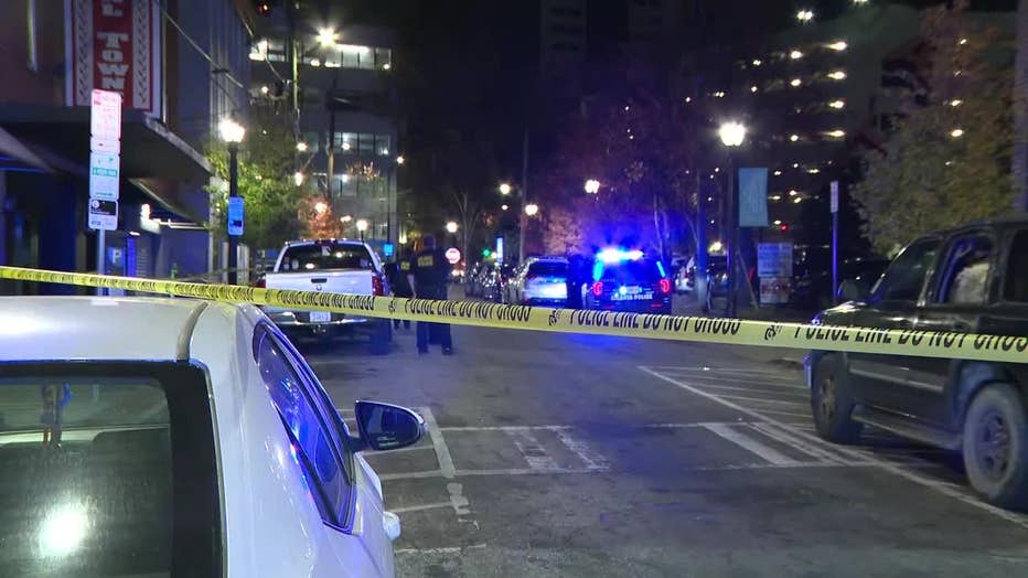 Atlanta police investigate a shooting in downtown Atlanta near Centennial Olympic Park on Dec. 4, 2024.