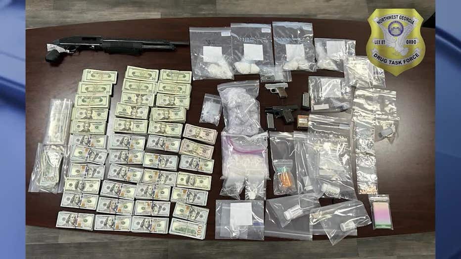 Heroin, cocaine, meth, pills, fentanyl, cash, and weapons were found inside a home during a raid along Mayfield Court in Paulding County on Nov. 14, 2024.